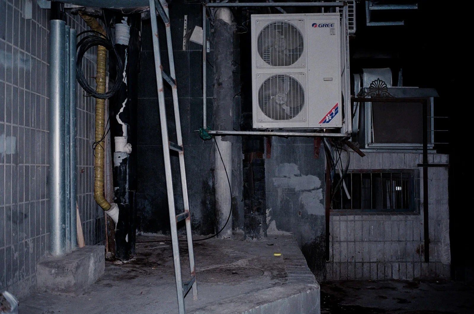 Technician reviewing efficiency ratings on new cooling equipment